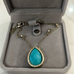 Costume jewelry turquoise colored necklace